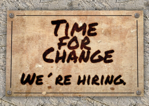 Image of wall sign: "Time for Change. We're hiring.