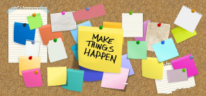 Yellow sticky reads "Make things happen."